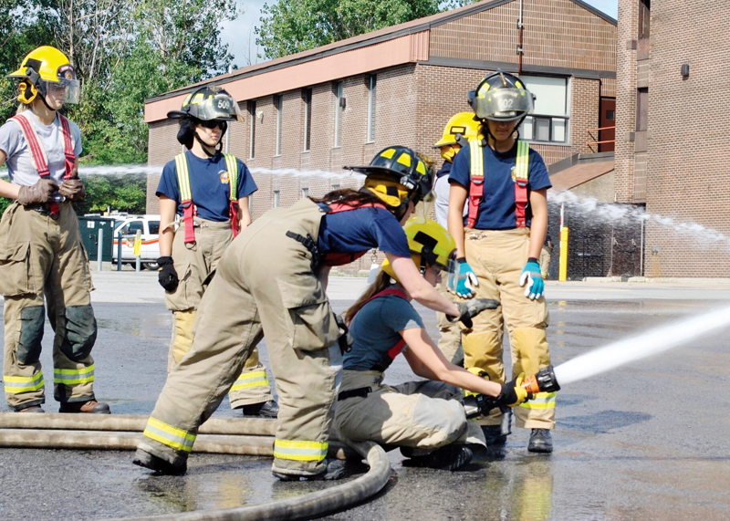 Local firefighter coaches girls at Camp FFIT