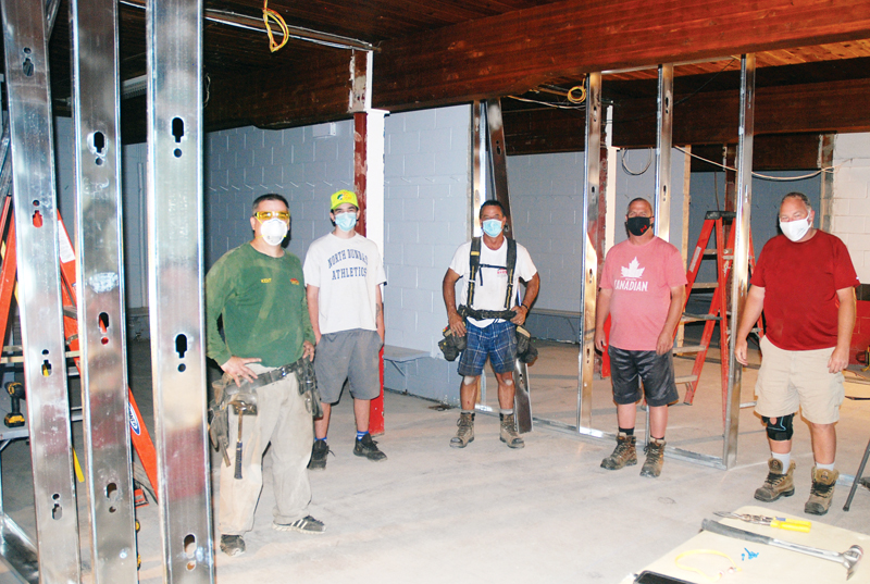 Volunteers make the difference at arena upgrade