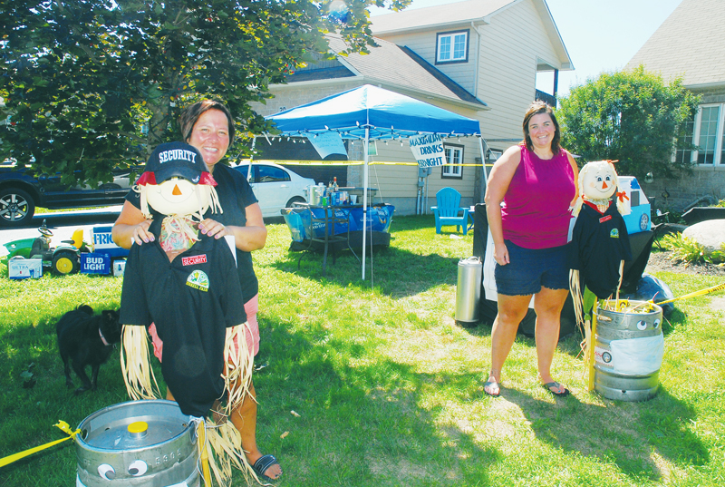 Russell Fair makes do with decorated village yards