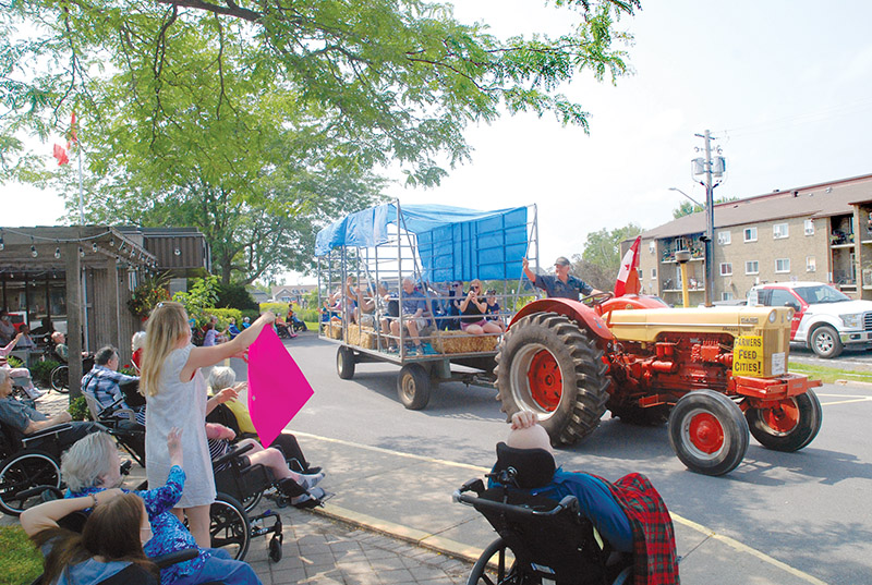 Tractor parade brings some relief to Dundas Manor residents