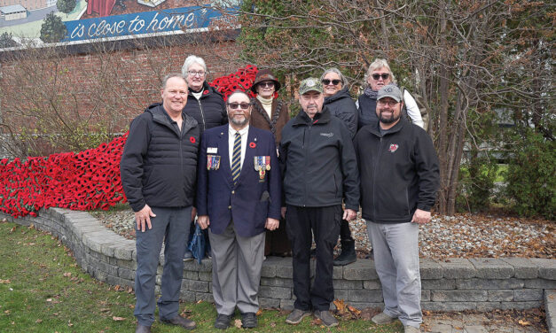 Crocheted poppies blanket both Winchester and Chesterville
