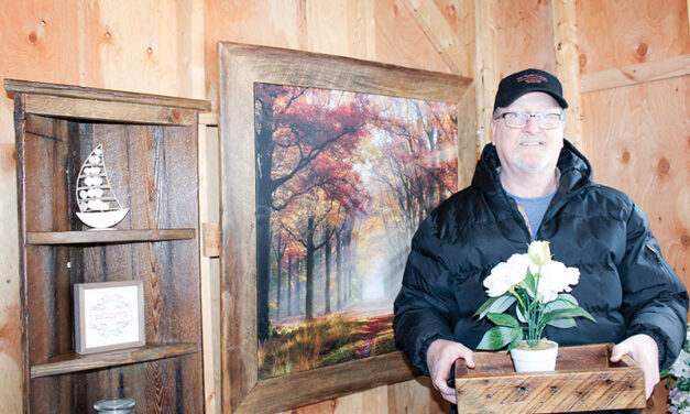 Transforming reclaimed barn wood into works of art