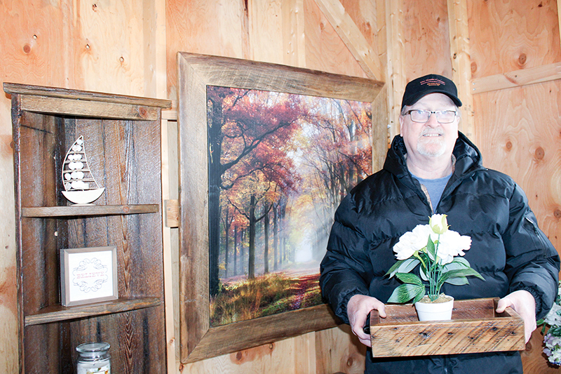 Transforming reclaimed barn wood into works of art