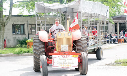 Tractor parade a fitting way to wrap up Dairyfest and warm some hearts