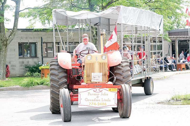 Tractor parade a fitting way to wrap up Dairyfest and warm some hearts
